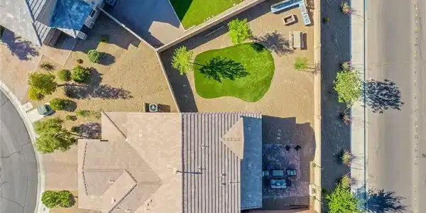 Image 3: An aerial view captures the home's exterior, showc