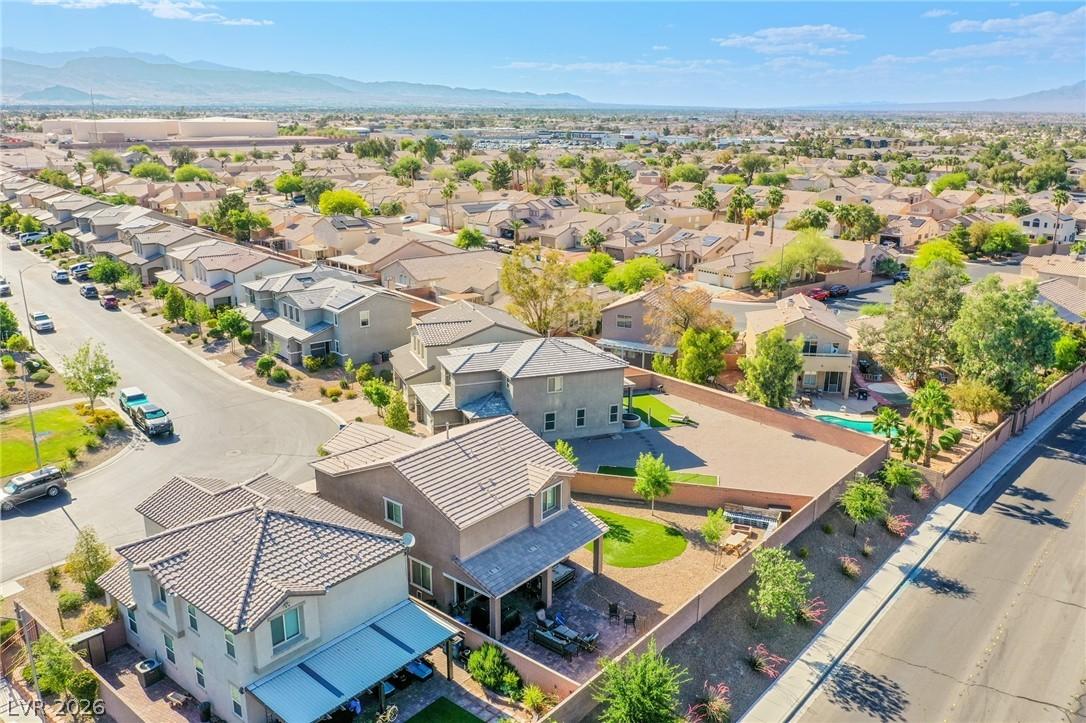 Image 4: An aerial perspective reveals a vibrant neighborho