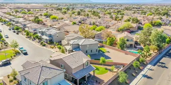 Image 4: An aerial perspective reveals a vibrant neighborho
