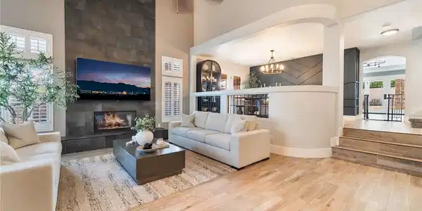 Image 4: An open floor plan seamlessly connects the living