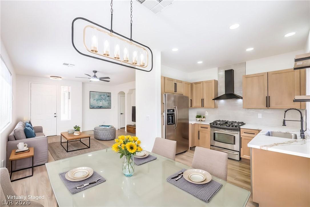 Image 3: An open concept design seamlessly connects the liv