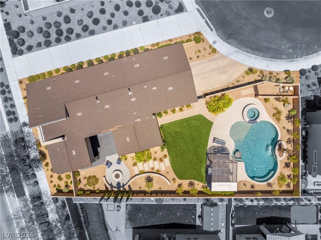 Image 2: An aerial perspective reveals a private yard with