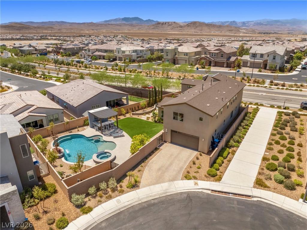 Image 3: An aerial perspective showcases a home with a refr