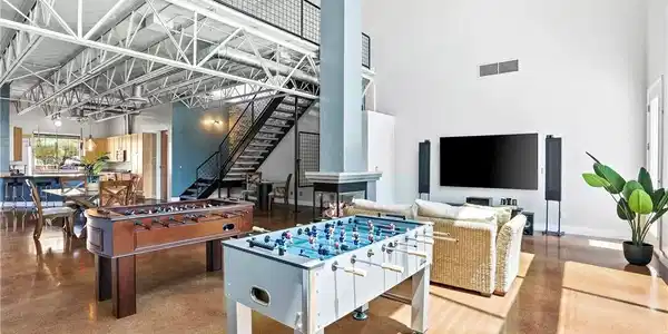 Image 4: This expansive great room offers open-concept livi