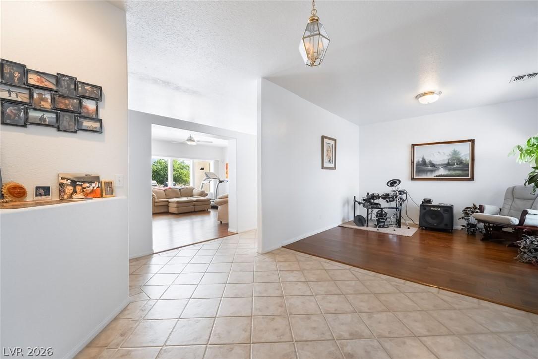 Image 4: This bright and airy interior features a harmoniou