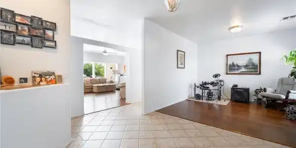 Image 4: This bright and airy interior features a harmoniou