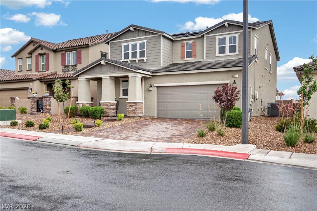 Image 2: Discover a charming two-story home with a paver dr