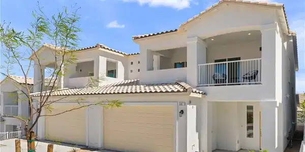 Image 4: Two-story architecture with tile roof and private