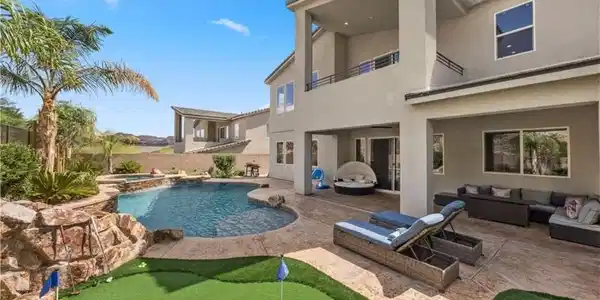 Image 4: Resort style backyard with pool, spa, covered pati