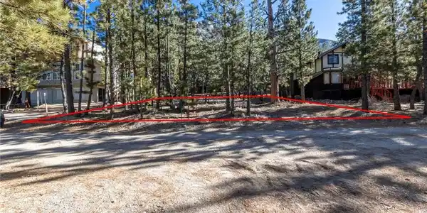 Image 3: from across the street looking into the lot