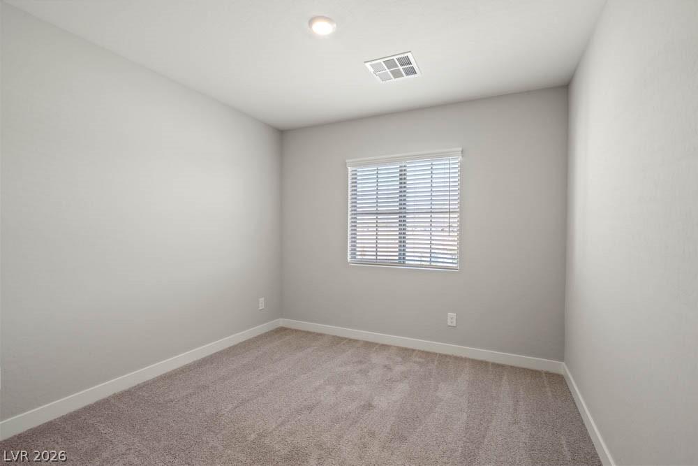 Image 4: This airy bedroom offers a tranquil retreat with a