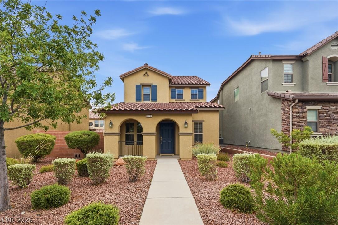 Image 2: A terracotta-tiled roof crowns this inviting home,