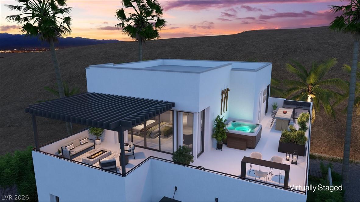 Image 3: An inviting rooftop deck includes options for a sp