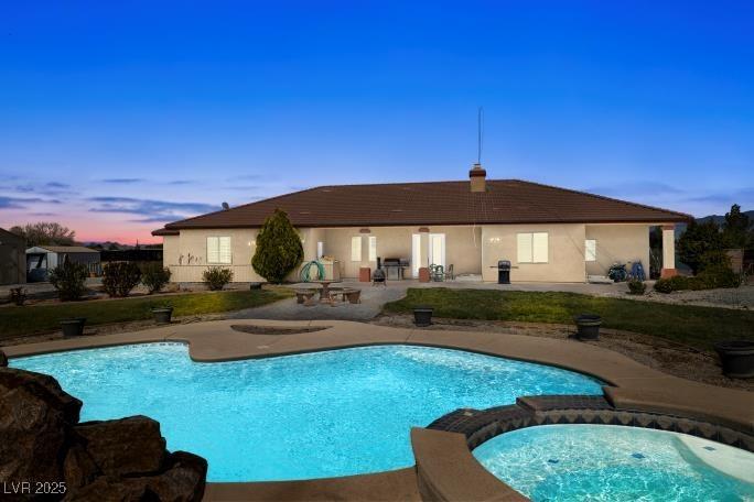 Image 3: View of swimming pool featuring a pool with connec