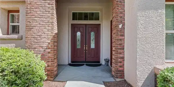 Image 4: A welcoming brick facade with a prominent double e