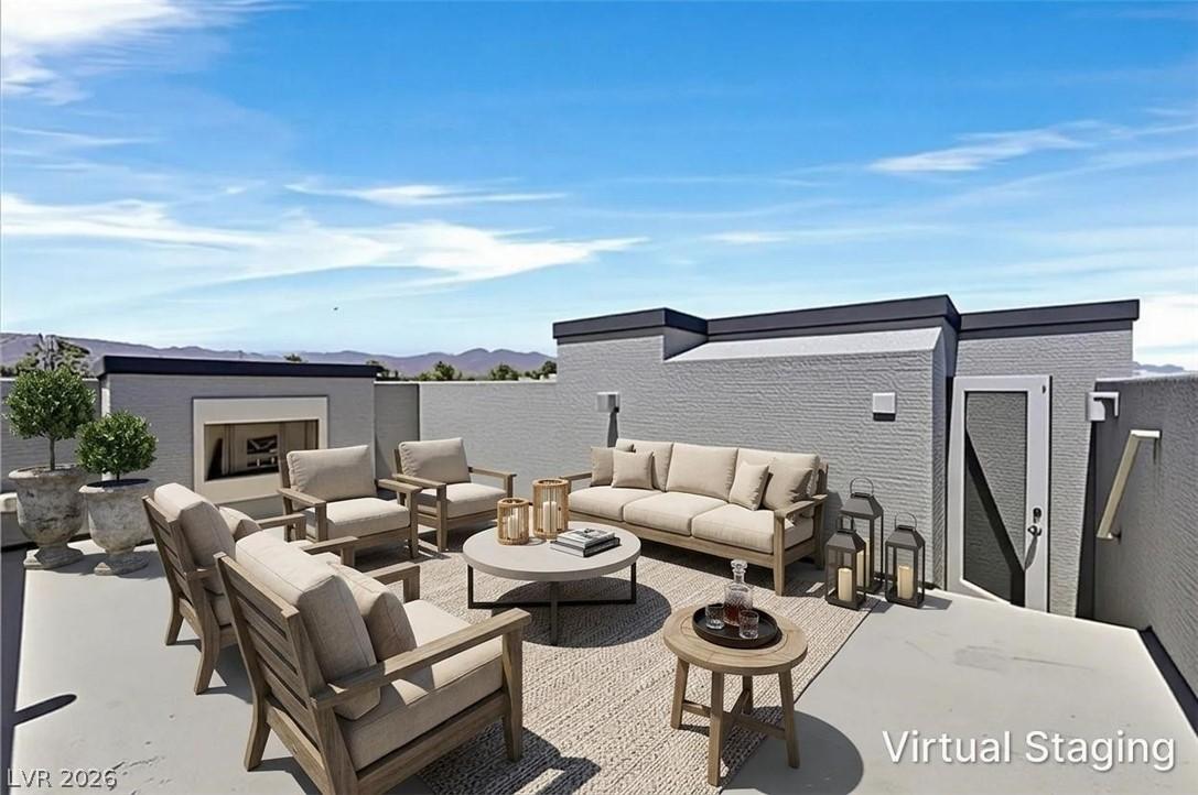 Image 4: Virtually staged 4th floor rooftop patio deck feat