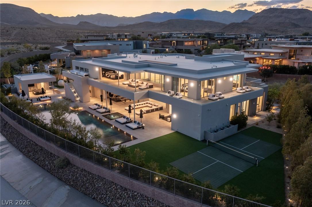 Image 2: An impressive modern dwelling boasts a shimmering