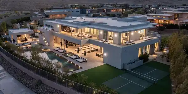 Image 2: An impressive modern dwelling boasts a shimmering
