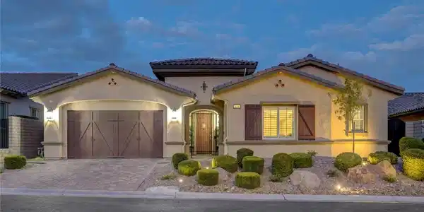 Image 4: A welcoming facade presents a private front entry