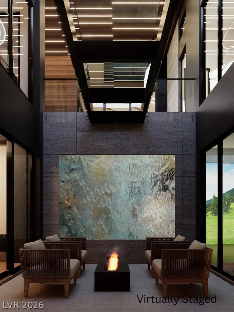 Image 2: An inviting outdoor living area features a modern