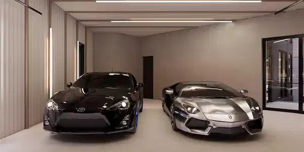 Image 3: A well-lit garage features sleek tile flooring, of