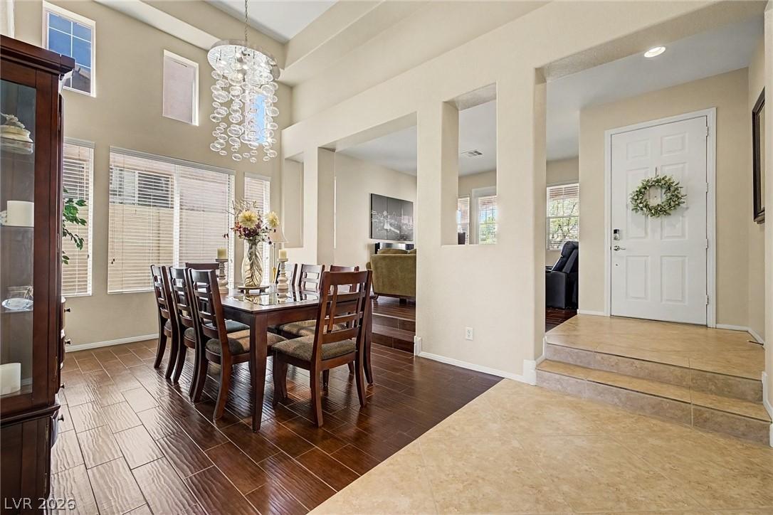 Image 4: This grand dining area features high ceilings and