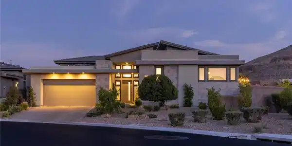 Image 2: This contemporary residence presents a striking st