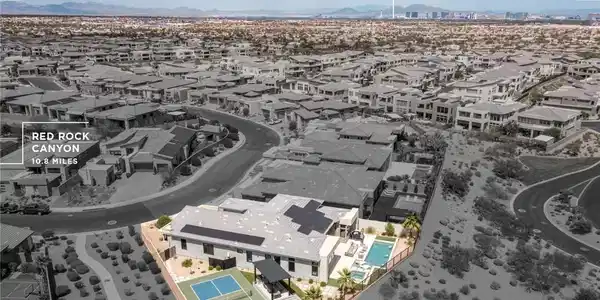 Image 3: An aerial perspective showcases this home's expans