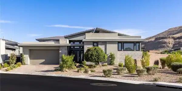 Image 4: A modern residence boasts a multi-textured exterio