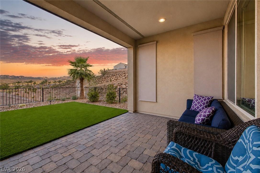 Image 3: Embrace breathtaking desert sunsets from this cove