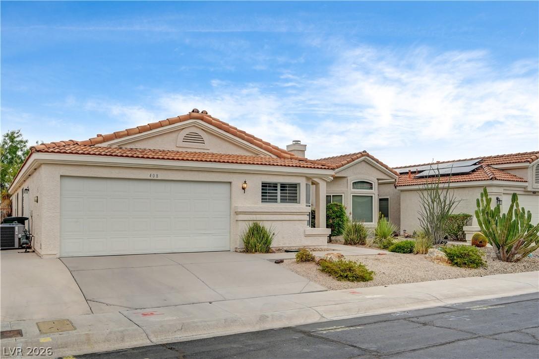 Image 2: A desert-friendly landscape accents the front of t