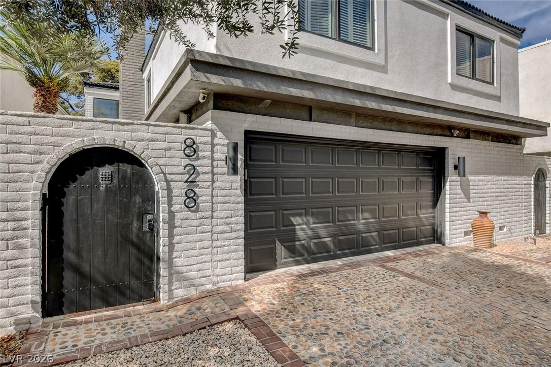 Image 4: This residence features a sophisticated exterior w