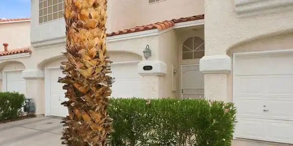 Image 4: Spanish tile rooflines and textured stucco siding