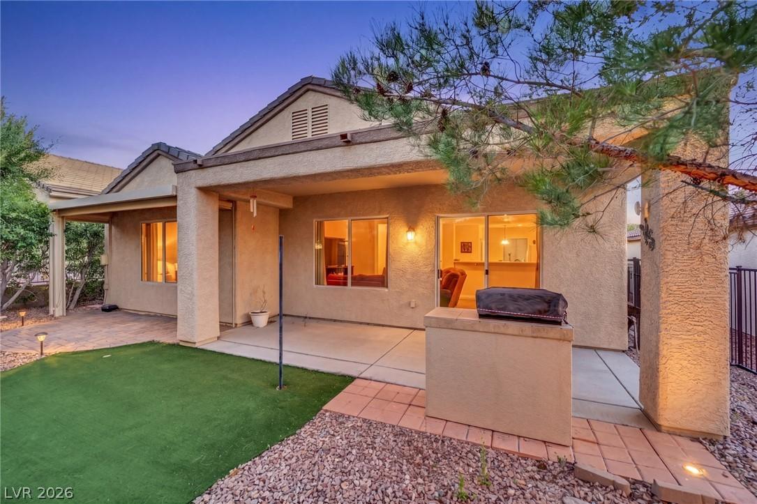 Image 2: A spacious backyard patio, perfect for evening gat