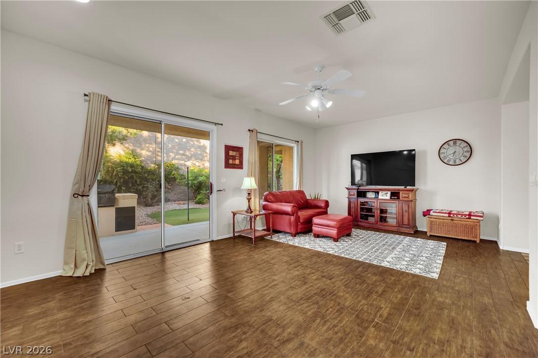 Image 3: Hardwood-style flooring and sliding glass doors cr