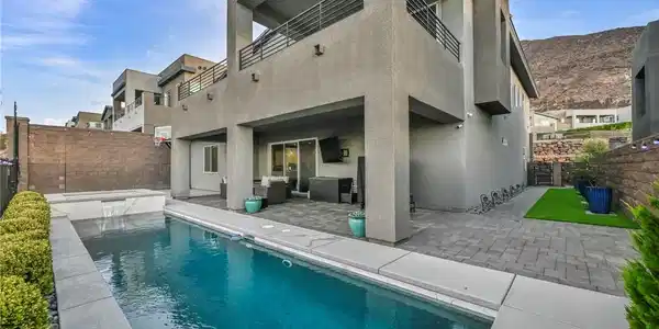 Image 2: An inviting private pool and spa complement the co