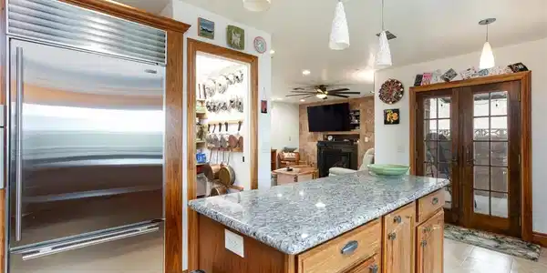Image 4: A well-appointed kitchen featuring a substantial g