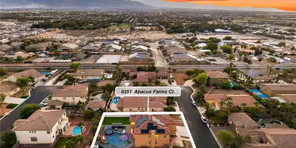 Image 2: An aerial perspective captures the custom backyard