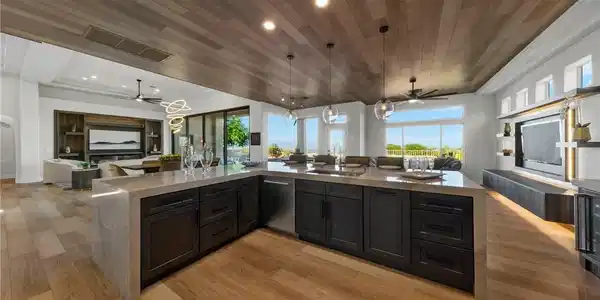 Image 3: Gourmet Kitchen with Site Lines Throughout the Hom