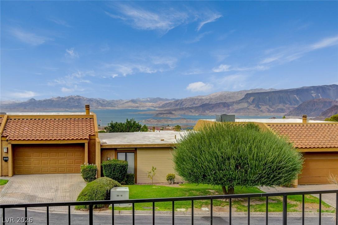 Image 2: Perched above Lake Mead, this home captures expans