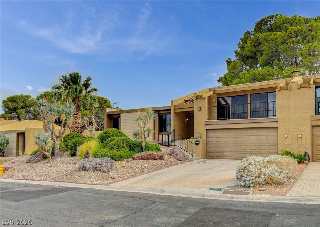 Image 3: Desert landscaping and a private balcony await.