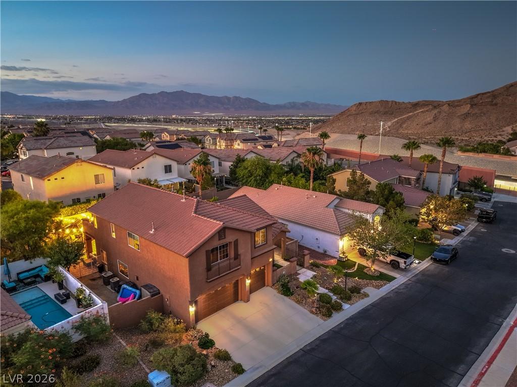 Image 4: An aerial perspective reveals a vibrant neighborho