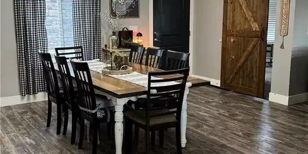 Image 2: Dining space with healthy amount of natural light,
