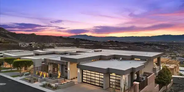 Image 3: Contemporary multi-car garage design integrates se