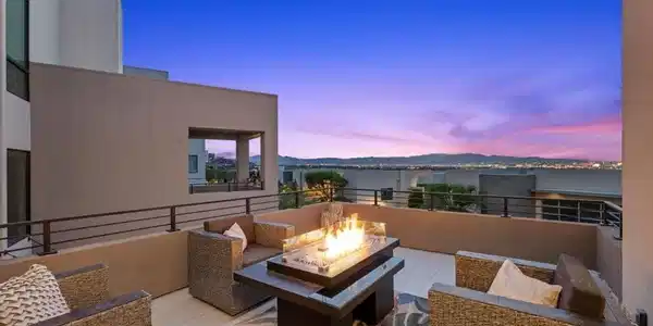 Image 4: BALCONY OFF LIVING ROOM NIGHT STRIP VIEW