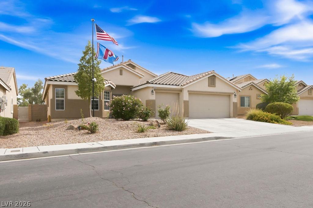 Image 2: This residence showcases a well-maintained exterio