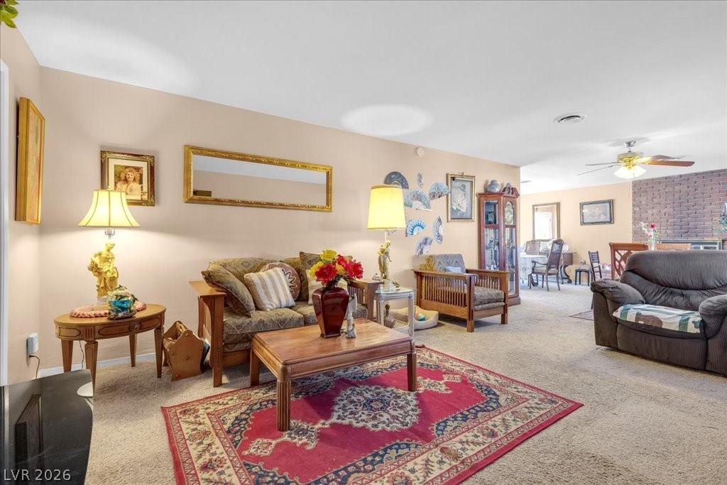 Image 4: Discover a welcoming living room featuring ample s