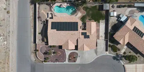 Image 2: An aerial perspective reveals a private pool with