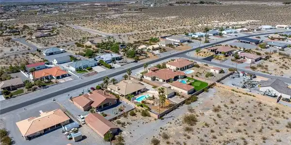 Image 3: Desert neighborhoods enjoy a backdrop of distant m