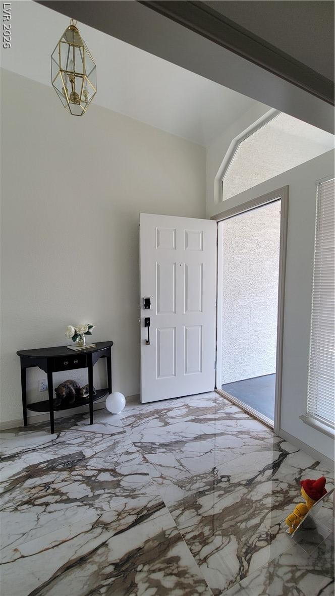 Image 3: Enter into elegance with striking marble flooring